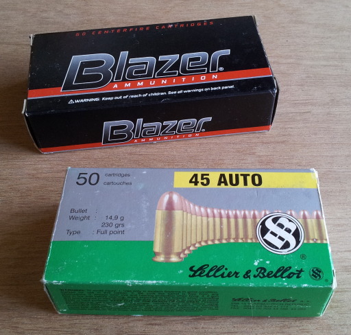 Boxes of .45 ACP cartridges: Sellier & Bellot and Blazer.