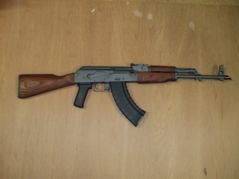 AK-47 rifle and its curved 'banana clip' magazine.