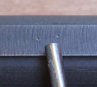 Punch marks on a CZ-52 slide.
