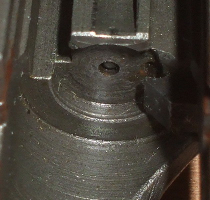 ČZ-52 slide, lying upside down.  The firing pin is in good shape, and is back within the slide.