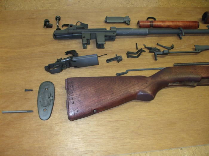 M1 Garand rifle collection of parts ready for assembly.  Rear half.