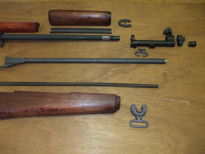 M1 Garand rifle collection of parts ready for assembly.  front half.