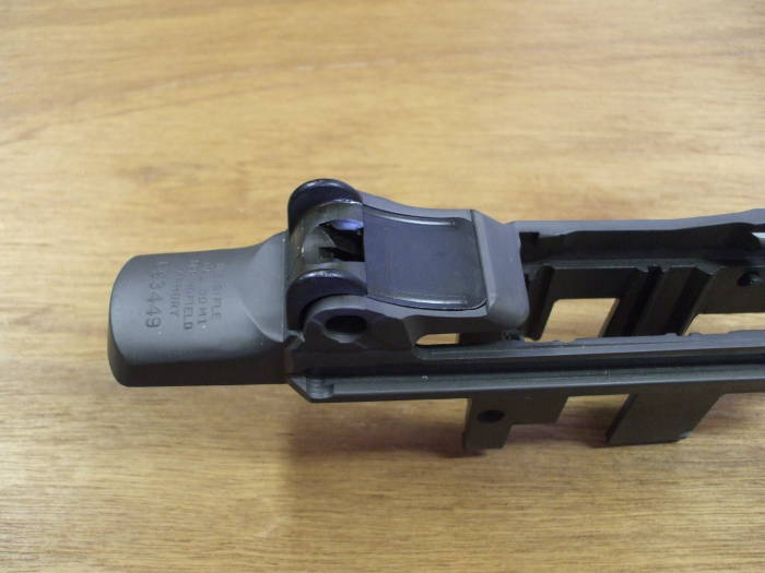 M1 Garand rifle, rear sight base and cover in place.