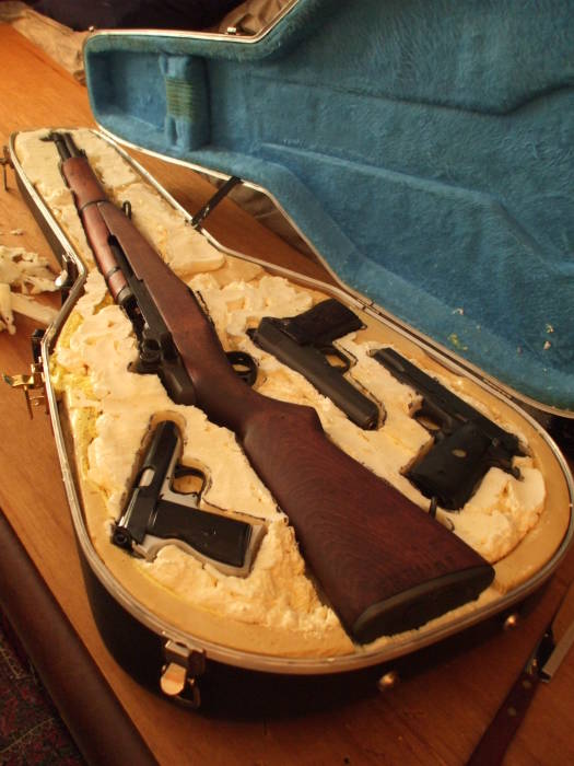 Pistols fit into carved slots.  FEG PA-63,  Česká Zbrojovka vzor 52, Norinco M1911A1.