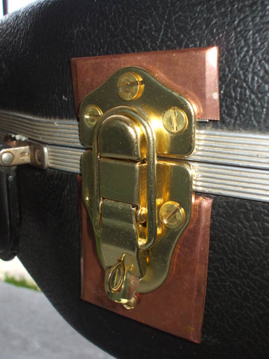 New brass latch installed on custom gun case.
