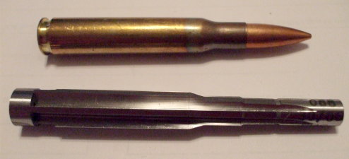 .30-06 cartridge and a .30-06 Springfield chamber reamer.