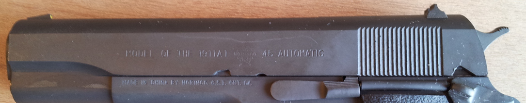 Slide of Norinco M1911 pistol.