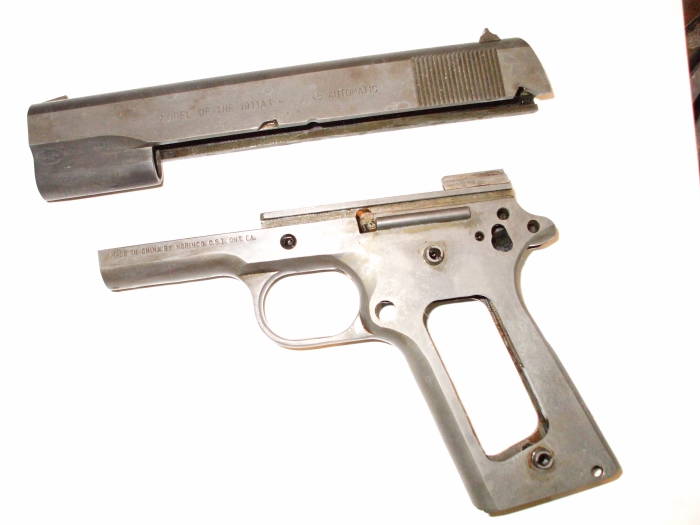 Norinco M1911A1 pistol frame and slide, original blued finish has been removed.