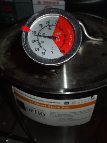 Measuring the temperature of the parkerizing solution: 170-180°F / 77-82°C.