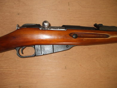 Izhevsk Mosin-Nagant or Three-line Rifle or Vintovka Mosina, closed bolt and magazine floor plate.