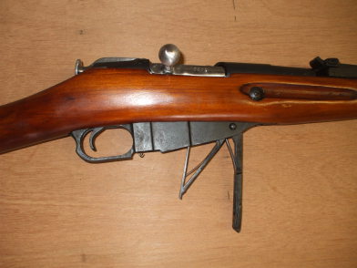 Izhevsk Mosin-Nagant or Three-line Rifle or Vintovka Mosina, open magazine floor plate.